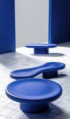 Modern blue sculptural podiums in minimalist interior