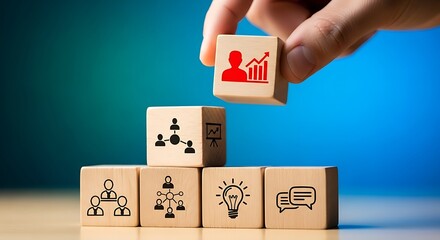 Hand placing wooden block symbolizing personal growth and success on top of business concept stack