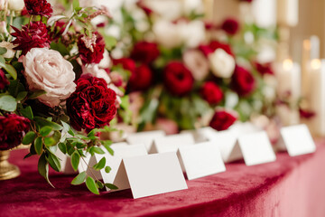 Luxury decorated wedding reception with place cards
