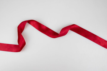 Red satin narrow ribbon for wrapping gifts