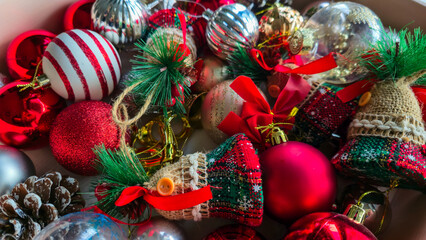 Box filled with colorful Christmas ornaments and decorations