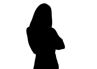 腕組みをするビジネスマンの女性のシルエット