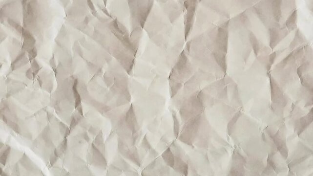 Beige Crumpled Paper Texture with Subtle Shadows and Creases background seamless looping backgrounds