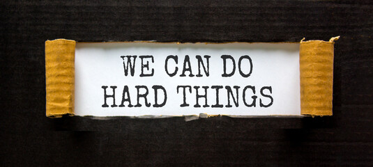 Support, help we can do hard things symbol. Concept words We can do hard things on beautiful white paper. Beautiful black paper background. Business we can do hard things concept. Copy space.