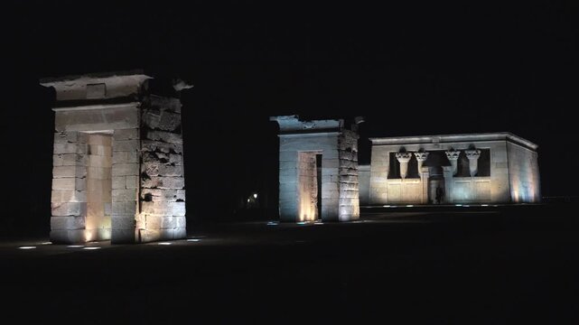 Madrid, Spain - December 30, 2025:  Templo de Debod - A large building with two pillars and a small building with two pillars. 