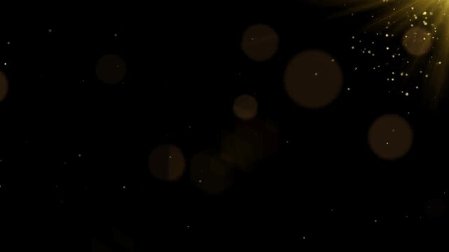Golden light rays with floating dust particles and bokeh on dark background, cinematic luxury sparkle animation loop video