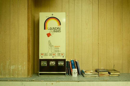 Laundry bag dispenser at Easthampton Laundromat, Easthampton, Massachusetts