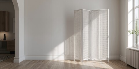 White folding screen in room serving as a decorative room divider, interior design elements