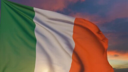 Vibrant Irish national flag proudly waving against a beautiful backdrop of a golden, dramatic sunset sky, symbolizing patriotism and national identity