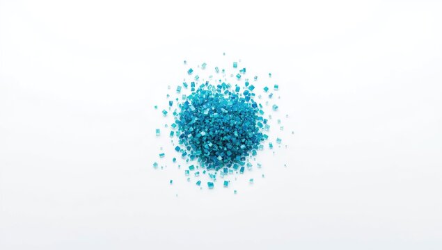 Polycarbonate polymer granules in blue and green hues on white surface, used for plastic company banners, Earth Day