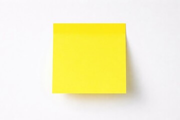 Close shot of a bright sticky note on a white matte panel