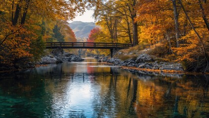 Scenic mountain stream passing under a bridge amidst fall foliage, highlighting erosion risk and seasonal transition
