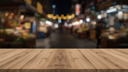 Night market scene with out-of-focus background and a bare wooden table, ideal for layout backgrounds