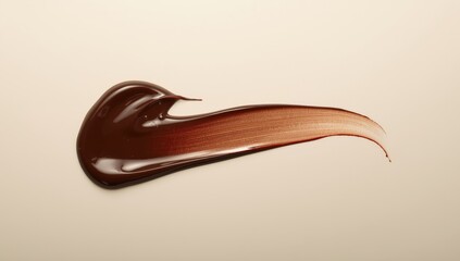 Neatly spread dark chocolate sauce from a top perspective, serving as a dessert garnish, World Chocolate Day