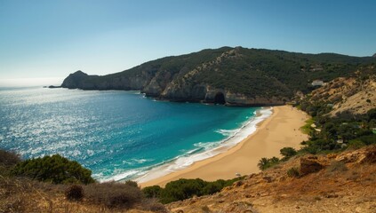 Fototapeta premium Binigaus Beach in southern Menorca, featuring natural shoreline and aquatic environment, highlighting erosion concerns