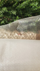 Artificial Christmas Tree Branches and Bubble Wrap Packing for Storage