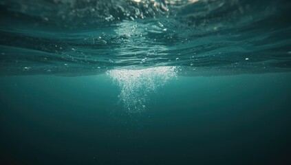 Underwater scene with ascending bubbles in clear green water, ideal for background design or layout.