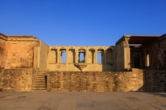 Balcony with arches sand stone construction in historic Chittorgarh fort, Rajasthan, India.