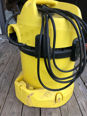 Yellow vacuum cleaner for cleaning the house, disassembled.