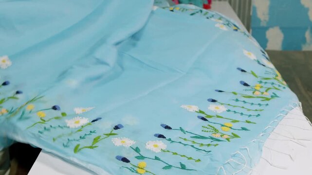 Printed fabric with artistic pattern in textile workshop, Saree