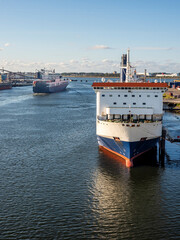 Cargo ships navigating Europoort waterway in Rotterdam
