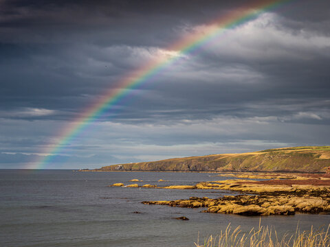 Rainbow arching over Fraserburgh Scotland coastline