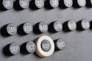 Stylish black calendar with dates and month marked November.