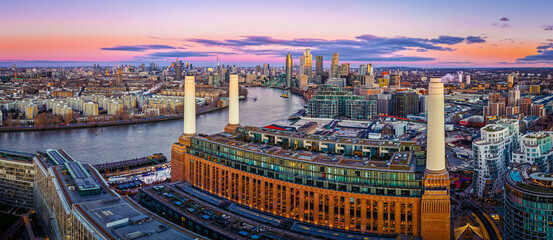 Aerial twilight panorama of Battersea Power Station redevelopment, London UK