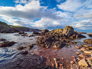 Rocky St Abbs coastline with North Sea at low tide