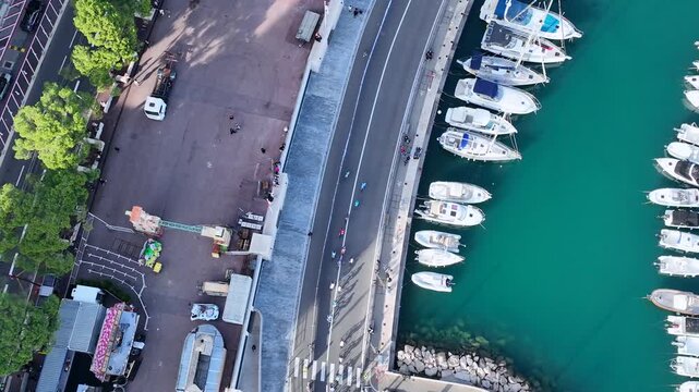 Drone shot of bikes during an international competition at Port Hercule, Monaco Monte Carlo.