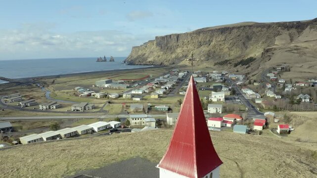 Drone shot in Iceland of a coast landscape with a church 