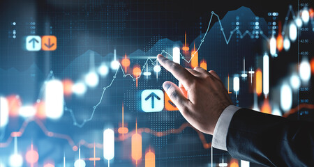 Businessman analyzing forex market graph with glowing stock chart on futuristic digital screen background for investment and crypto trading concept.