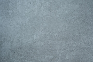 Blue toned concrete wall texture background with fine details and surface grain