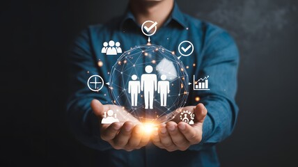 Person holding a glowing sphere with interconnected human and various symbols above it hands
