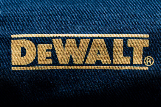 Yellow DeWalt logo on a black sawdust bag, close up