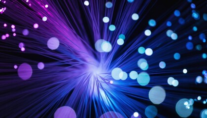 Glowing fiber optic cable bundle radiating with purple and blue light, creating a futuristic technology background with a beautiful bokeh effect from a central point