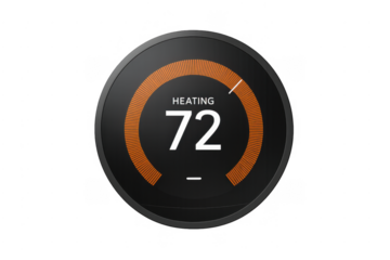 Smart thermostat digital display showing heating temperature