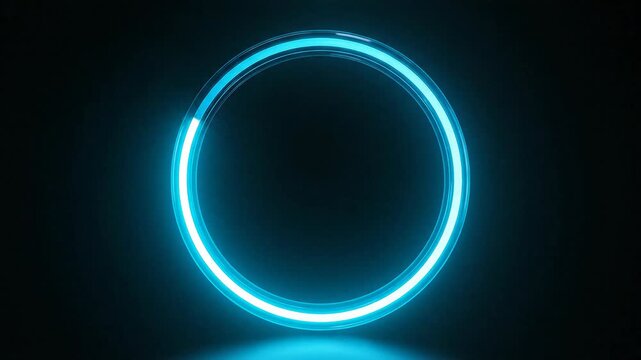 Glowing cyan blue neon ring hovers magically in absolute darkness creating an abstract circular light effect