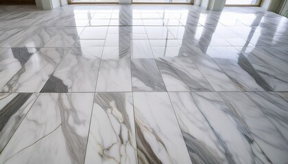 a wide angle view of a pristine white marble floor with subtle gray veining capturing the elegance and luxurious texture of the stone