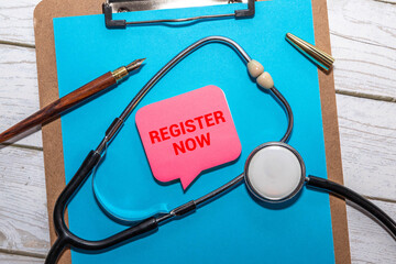 Register now message written on ripped torn paper background.