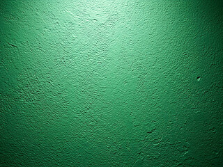 Rough gray concrete material forms an old grunge wall texture with a weathered stone surface and mottled paint patterns on a blank architectural backdrop