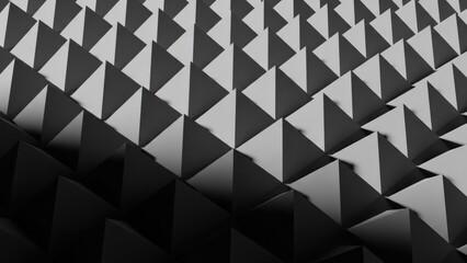 Abstract geometric pyramids in repeating pattern, creating a striking visual texture in monochromatic style