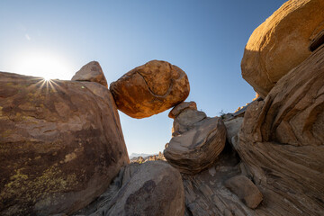 Balance Rock With A Sun Burst To The Left