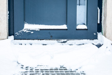 Snow Covered Building Entrance Door Threshold In Winter Conditions
