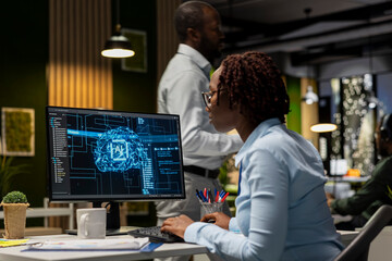 African american woman pleased with AI integration success for efficiency recognition, using a synergy of data sharing and optimization models in a co working space. Progress prosperity.