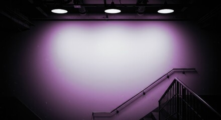 Interior shot of a stairway with a pale purple wall and spotlights