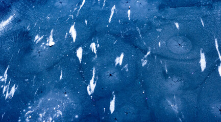 Frozen water surface creating abstract ice patterns