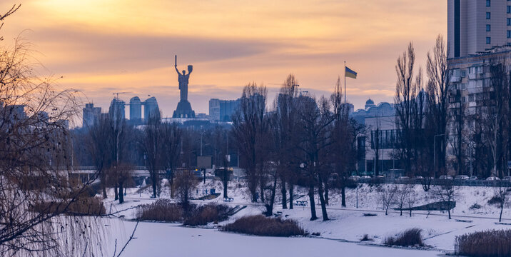 Mother Ukraine monument standing over Kyiv city in winter