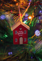 house decorated on christmas tree sweet home inscription