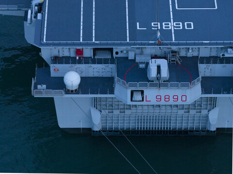 Aerial view of the imposing LHD Trieste with its prominent 'L 9890' designation casting a stark shadow, Trieste,, Italy.